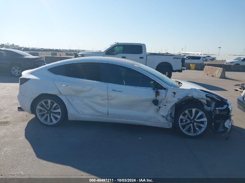 2018 Tesla Model 3 Long Range/Mid Range VIN: 5YJ3E1EA4JF027291 Lot: 40497211