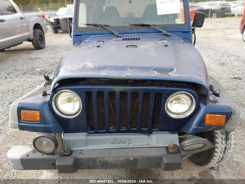 2002 Jeep Wrangler Sport VIN: 1J4FA49SX2P753767 Lot: 40497283