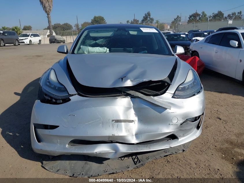 5YJ3E1EA9JF007893 2018 Tesla Model 3 Long Range/Mid Range