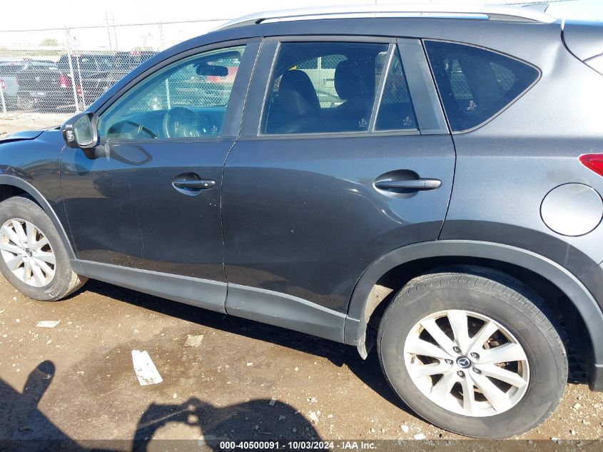 2014 Mazda Cx-5 Touring VIN: JM3KE2CY0E0338097 Lot: 40500091