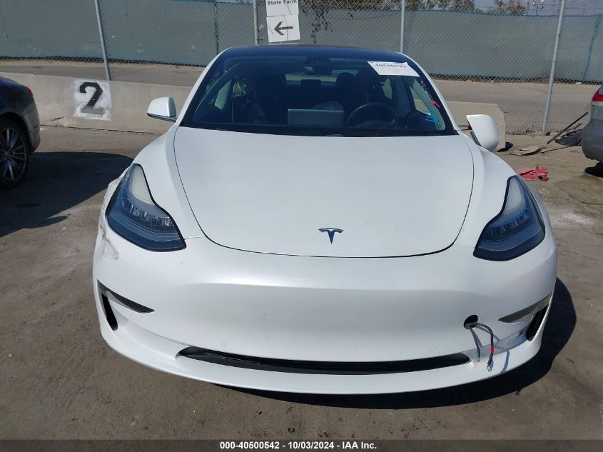 5YJ3E1EA3JF161709 2018 Tesla Model 3 Long Range/Mid Range