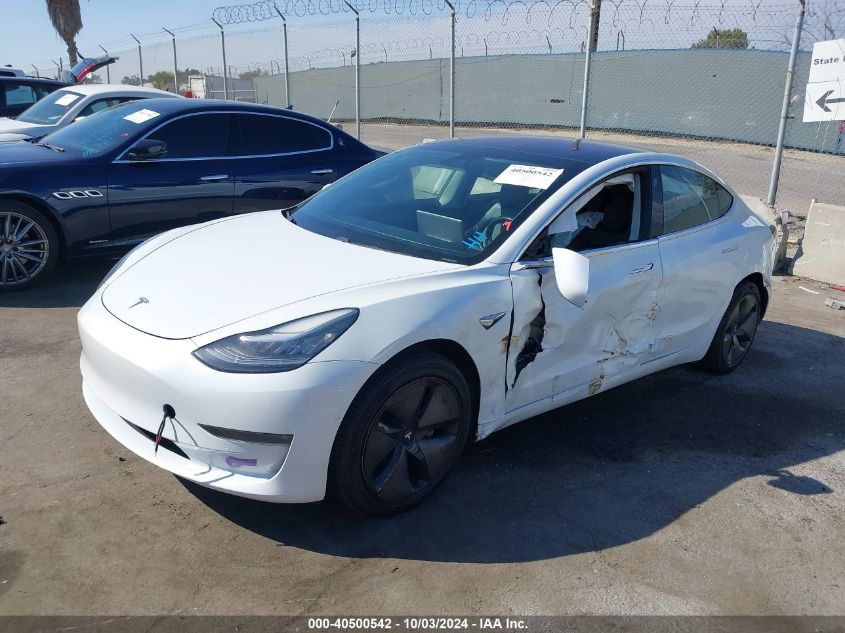 5YJ3E1EA3JF161709 2018 Tesla Model 3 Long Range/Mid Range