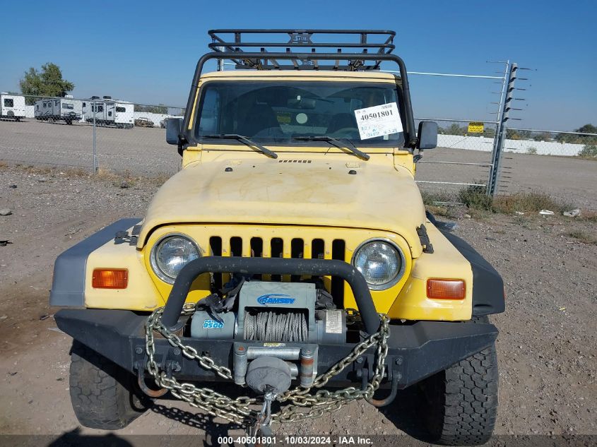 1999 Jeep Wrangler Sport VIN: 1J4FY19S6XP445237 Lot: 40501801