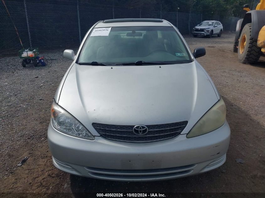 2003 Toyota Camry Le V6 VIN: 4T1BF32K83U563071 Lot: 40502026