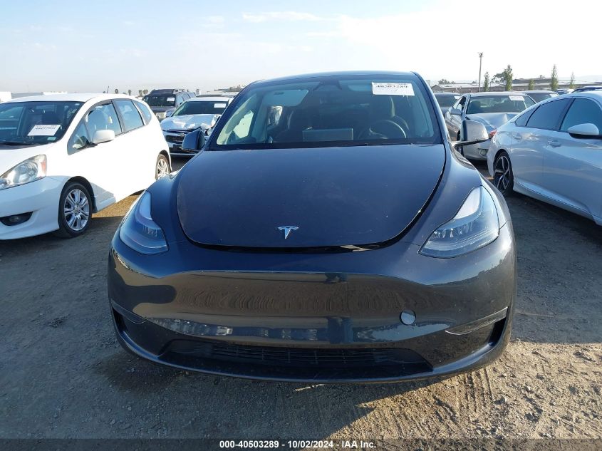 2024 Tesla Model Y Long Range Dual Motor All-Wheel Drive VIN: 7SAYGDED1RF050277 Lot: 40503289