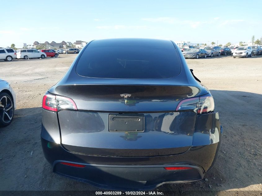 2024 Tesla Model Y Long Range Dual Motor All-Wheel Drive VIN: 7SAYGDED1RF050277 Lot: 40503289