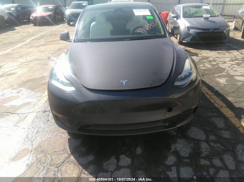 2022 Tesla Model Y Long Range Dual Motor All-Wheel Drive VIN: 7SAYGAEE9NF570597 Lot: 40504181