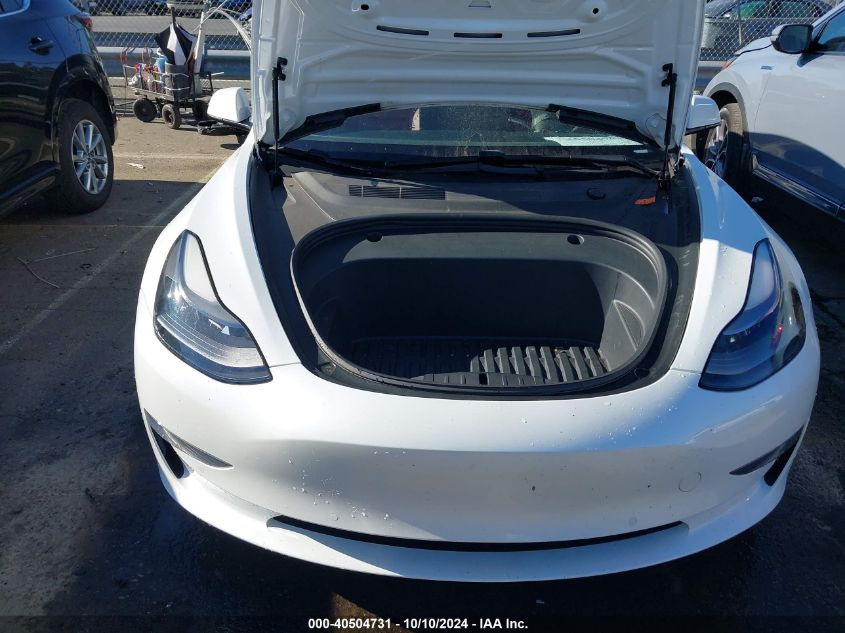 2021 Tesla Model 3 Long Range Dual Motor All-Wheel Drive VIN: 5YJ3E1EB7MF974757 Lot: 40504731