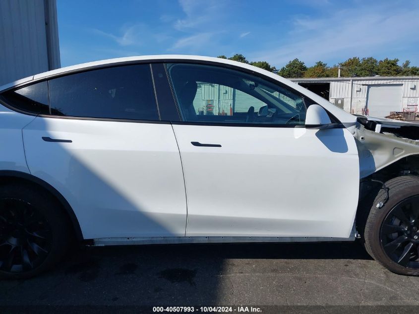 2023 Tesla Model Y Awd/Long Range Dual Motor All-Wheel Drive VIN: 7SAYGDEE8PA061201 Lot: 40507993