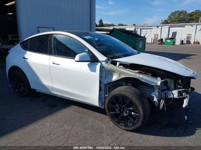 VIN 7SAYGDEE8PA061201 2023 Tesla Model Y, Awd/Long... no.1