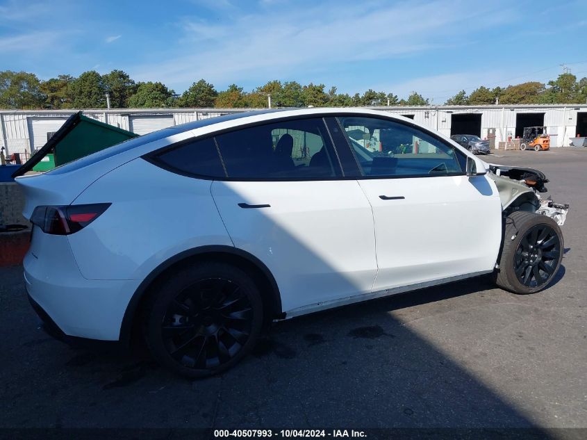 VIN 7SAYGDEE8PA061201 2023 Tesla Model Y, Awd/Long... no.4