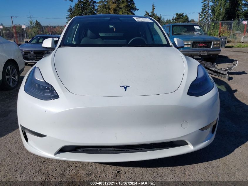 2023 Tesla Model Y VIN: 7SAYGDEE6PF807244 Lot: 40512021