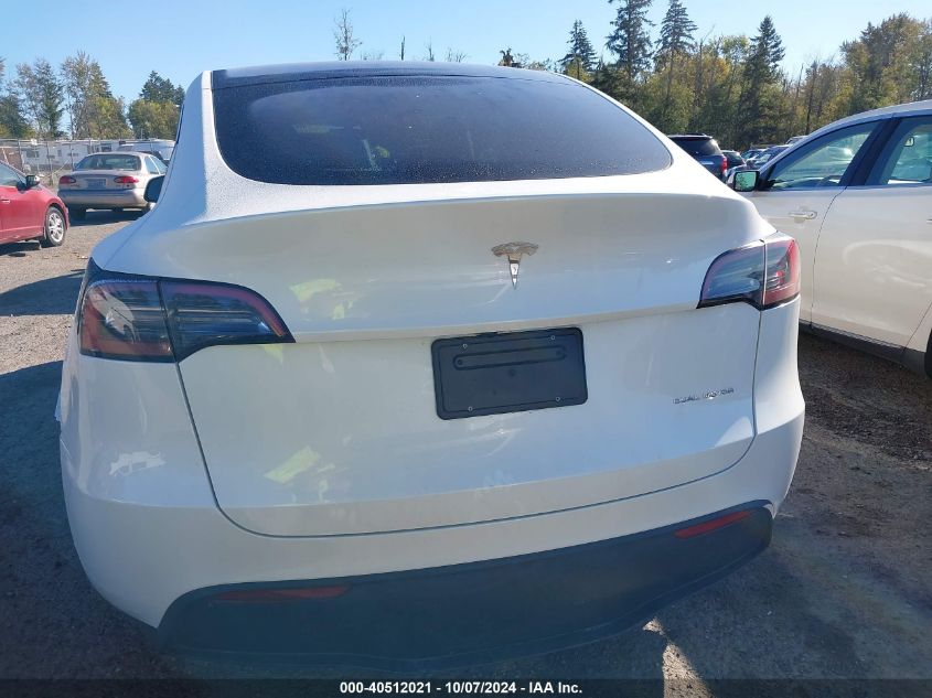 2023 Tesla Model Y VIN: 7SAYGDEE6PF807244 Lot: 40512021