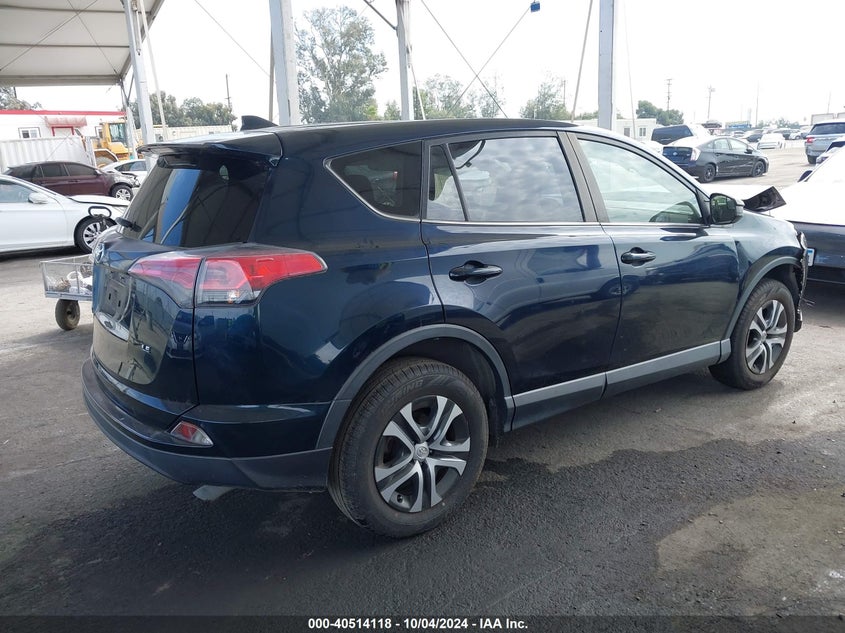VIN JTMZFREV6JJ206028 2018 TOYOTA RAV4 LE