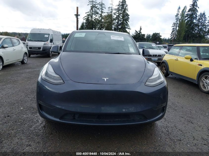 2021 Tesla Model Y Standard Range Rear-Wheel Drive VIN: 5YJYGDED0MF106148 Lot: 40519448