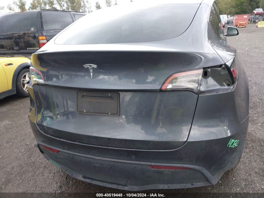 2021 Tesla Model Y Standard Range Rear-Wheel Drive VIN: 5YJYGDED0MF106148 Lot: 40519448