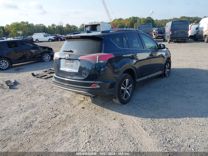 VIN JTMRFREV9JJ736042 2018 TOYOTA RAV4 XLE