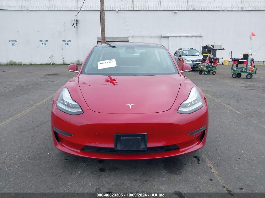 2018 Tesla Model 3 Long Range/Performance VIN: 5YJ3E1EB7JF114661 Lot: 40523305