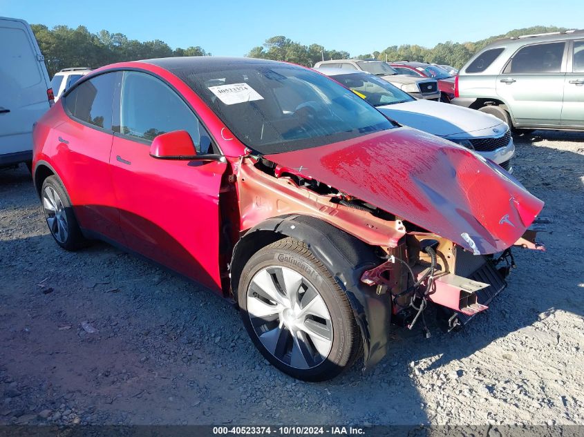 2023 Tesla Model Y Awd/Long Range Dual Motor All-Wheel Drive VIN: 7SAYGDEE7PF667592 Lot: 40523374