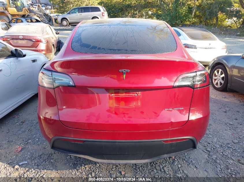 2023 Tesla Model Y Awd/Long Range Dual Motor All-Wheel Drive VIN: 7SAYGDEE7PF667592 Lot: 40523374