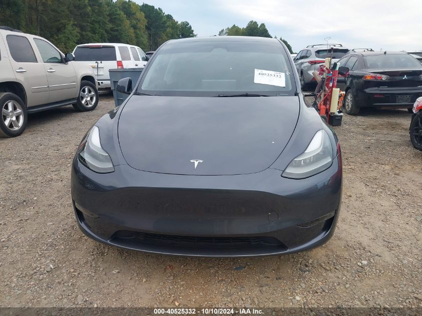 2023 Tesla Model Y Awd/Long Range Dual Motor All-Wheel Drive VIN: 7SAYGDEE9PF663902 Lot: 40525332