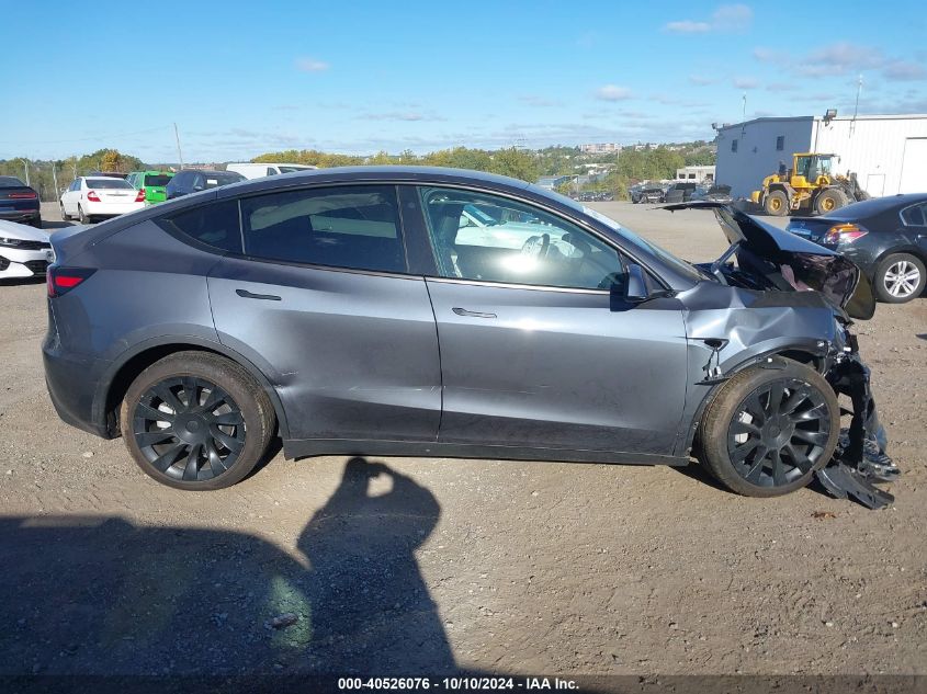 2023 Tesla Model Y Awd/Long Range Dual Motor All-Wheel Drive VIN: 7SAYGDEEXPF766262 Lot: 40526076