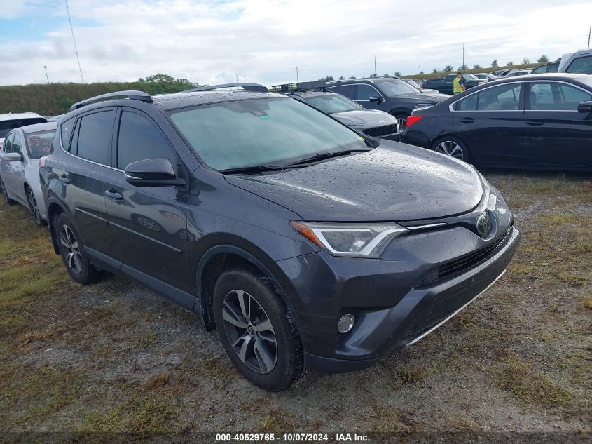 JTMWFREVXHJ130293 2017 TOYOTA RAV 4 - Image 1