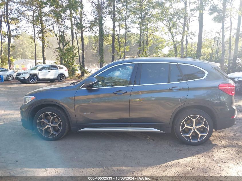 2018 BMW X1 Sdrive28I VIN: WBXHU7C3XJ5H40719 Lot: 40532539