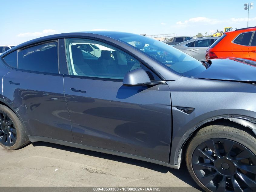 2023 Tesla Model Y Awd/Long Range Dual Motor All-Wheel Drive VIN: 7SAYGAEE4PF711966 Lot: 40533380