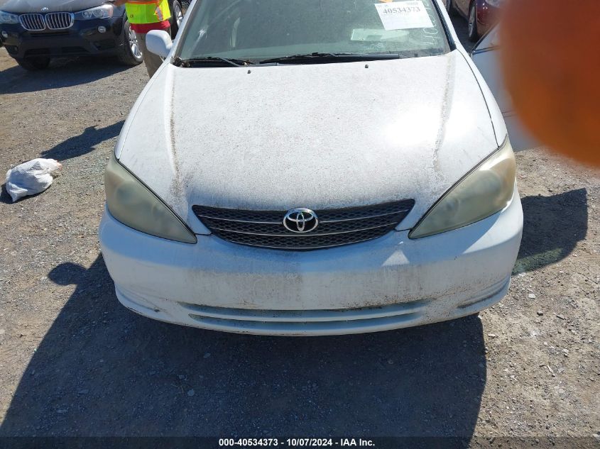 2004 Toyota Camry Le VIN: 4T1BE32K04U306703 Lot: 40534373