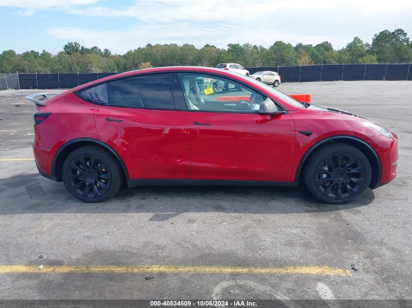 2023 Tesla Model Y Awd/Long Range Dual Motor All-Wheel Drive VIN: 7SAYGDEE4PF707613 Lot: 40534509