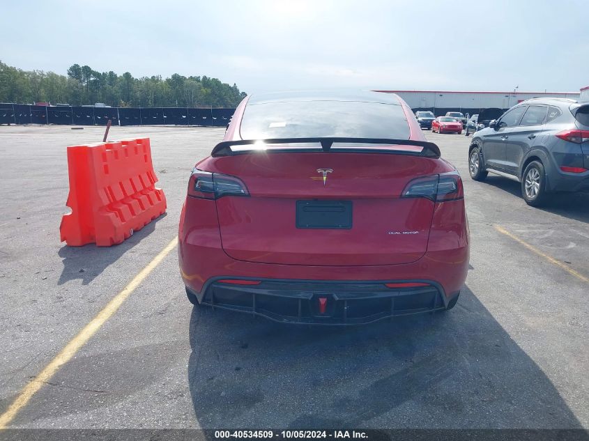 2023 Tesla Model Y VIN: 7SAYGDEE4PF707613 Lot: 40534509