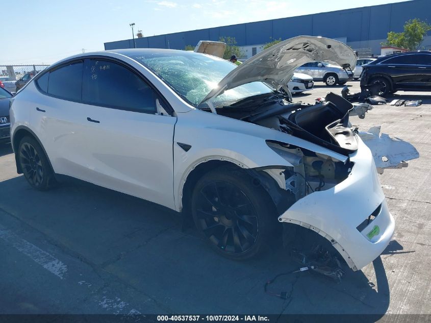 2023 Tesla Model Y Awd/Long Range Dual Motor All-Wheel Drive VIN: 7SAYGDEE8PF706237 Lot: 40537537