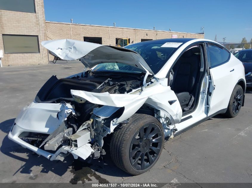 2023 Tesla Model Y Awd/Long Range Dual Motor All-Wheel Drive VIN: 7SAYGDEE8PF706237 Lot: 40537537