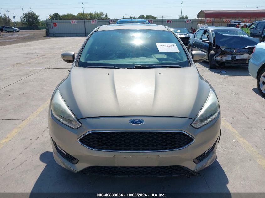 2015 Ford Focus Se VIN: 1FADP3F25FL209738 Lot: 40538034