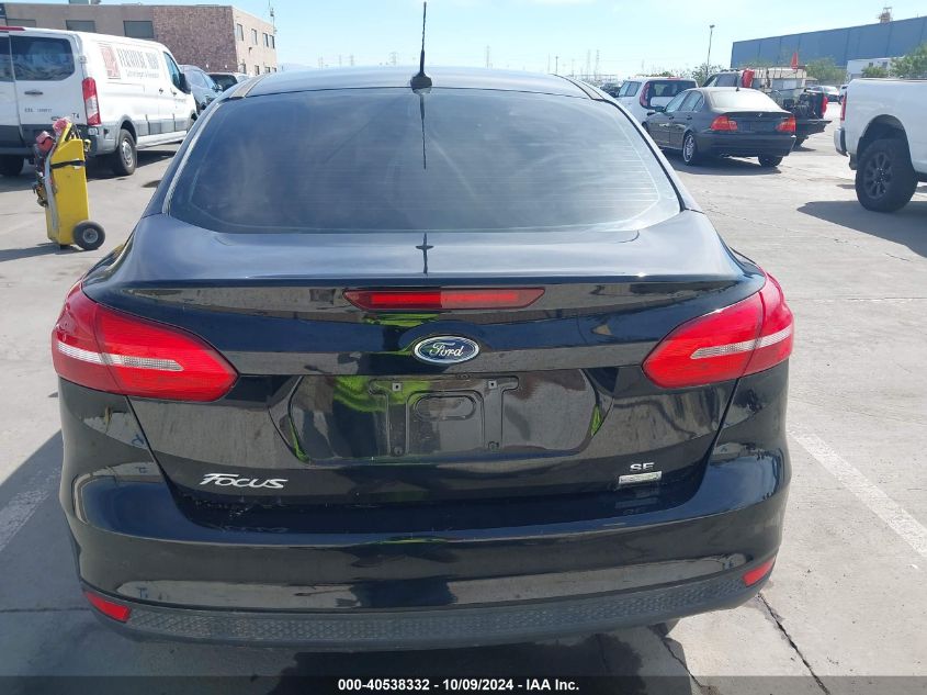 2018 Ford Focus Se VIN: 1FADP3FEXJL205784 Lot: 40538332