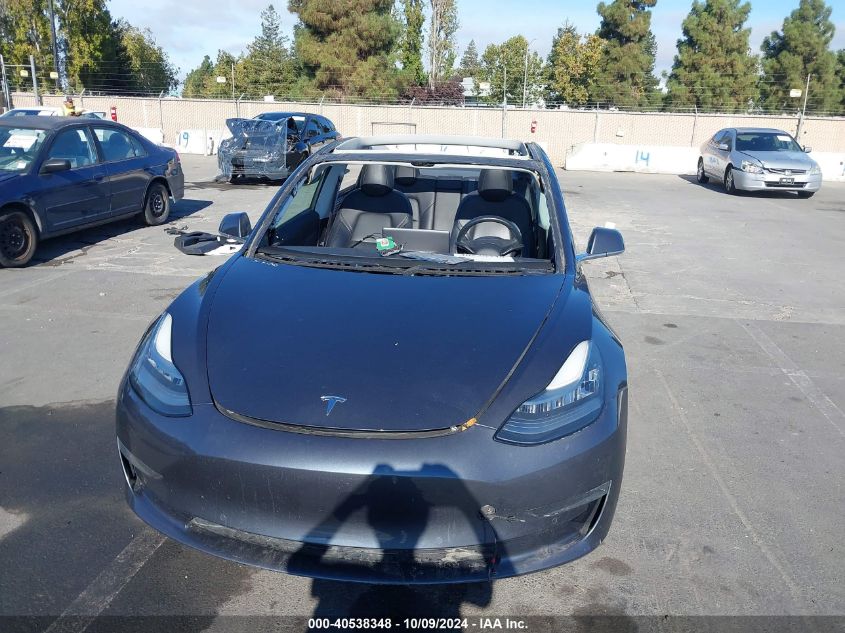 2018 Tesla Model 3 VIN: 5YJ3E1EA7JF033831 Lot: 40538348