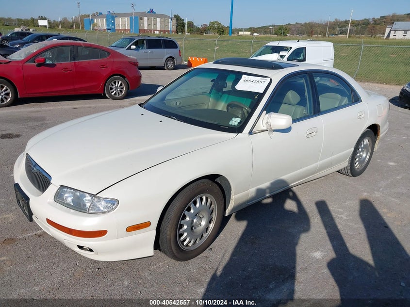 1998 MAZDA MILLENIA JM1TA2218W1****** from the USA