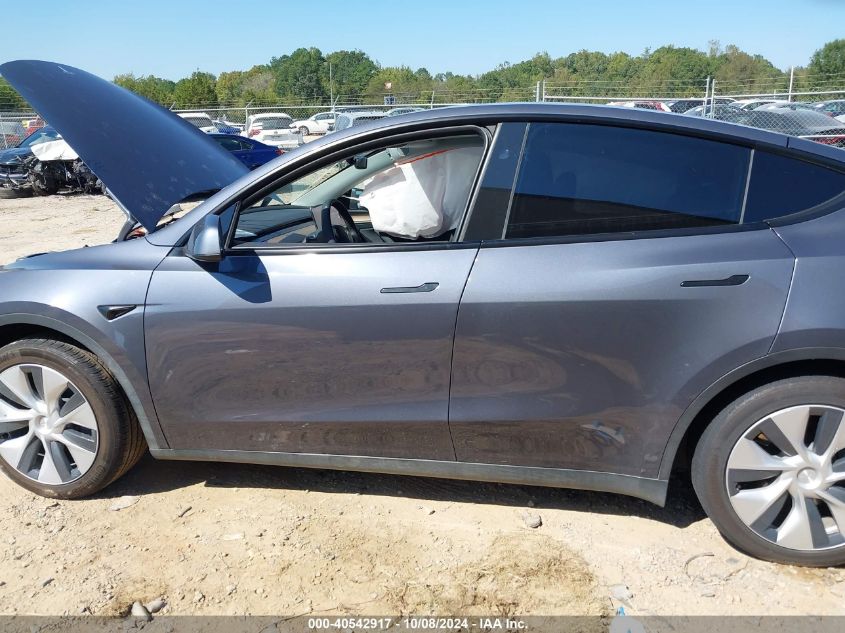 2023 Tesla Model Y Awd/Long Range Dual Motor All-Wheel Drive VIN: 7SAYGDEE4PF880614 Lot: 40542917