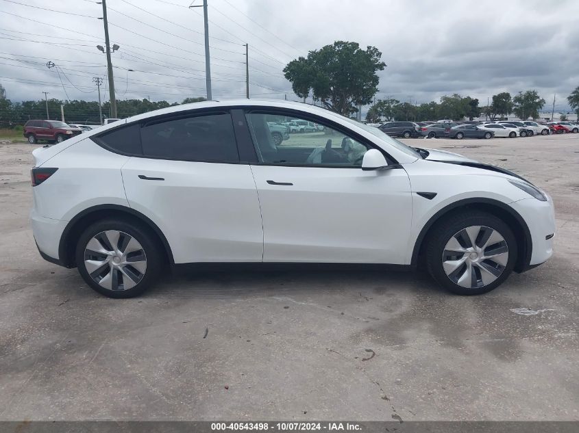 2023 Tesla Model Y Awd/Long Range Dual Motor All-Wheel Drive VIN: 7SAYGDEE8PA179376 Lot: 40543498