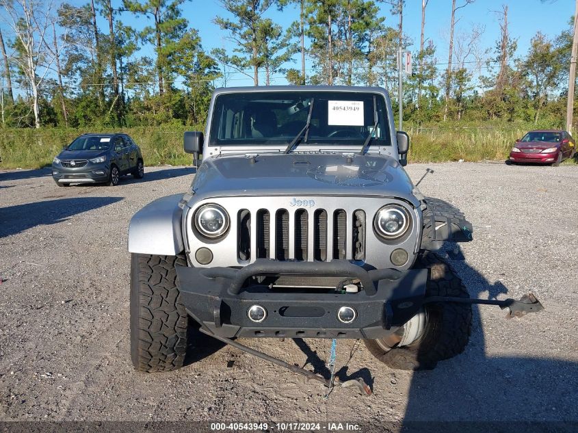 2015 Jeep Wrangler Unlimited Freedom Edition VIN: 1C4BJWDG0FL586657 Lot: 40543949