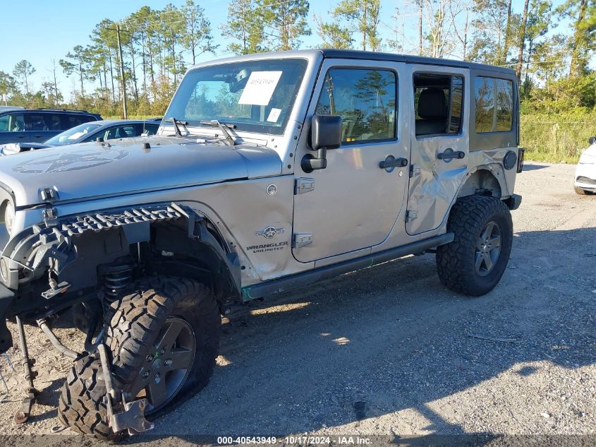 2015 Jeep Wrangler Unlimited Freedom Edition VIN: 1C4BJWDG0FL586657 Lot: 40543949