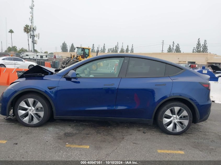 2023 Tesla Model Y Awd/Long Range Dual Motor All-Wheel Drive VIN: 7SAYGAEEXPF752800 Lot: 40547051