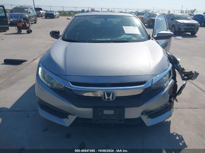 2HGFC4B04JH306364 2018 Honda Civic Lx