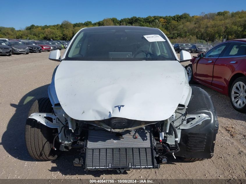 2024 Tesla Model Y Long Range Dual Motor All-Wheel Drive VIN: 7SAYGDEE7RA311921 Lot: 40547755