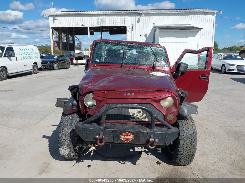 2007 Jeep Wrangler Unlimited Sahara VIN: 1J4GA59127L105856 Lot: 40549250