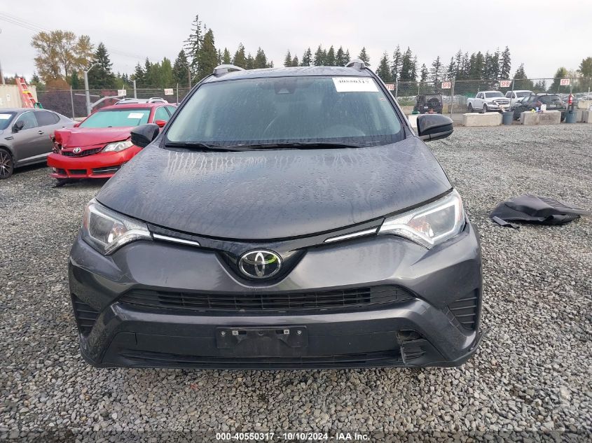 2T3ZFREV4JW517328 2018 Toyota Rav4 Le