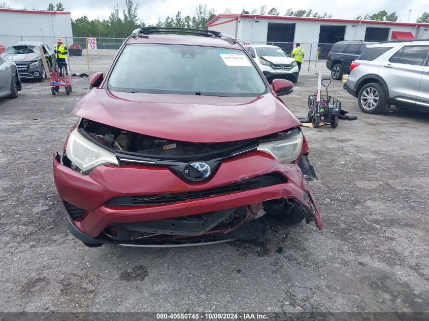 JTMRJREV5JD190675 2018 Toyota Rav4 Hv Le Plus/Xle