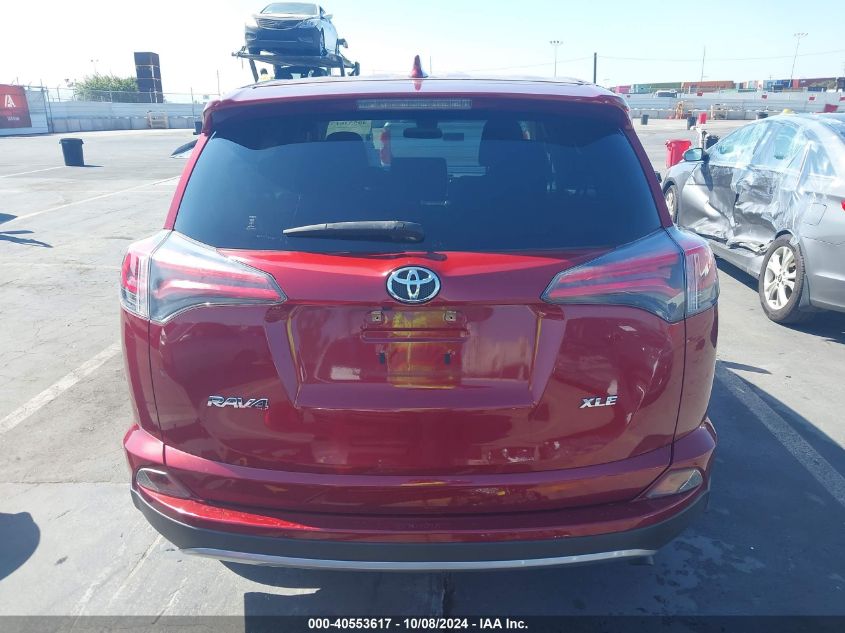 JTMWFREV9JD109018 2018 Toyota Rav4 Xle