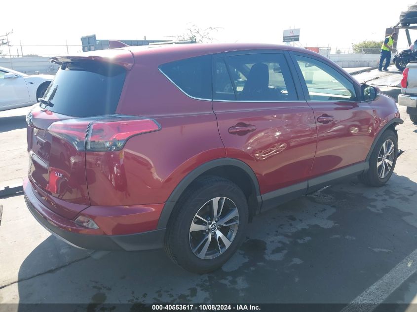 JTMWFREV9JD109018 2018 Toyota Rav4 Xle